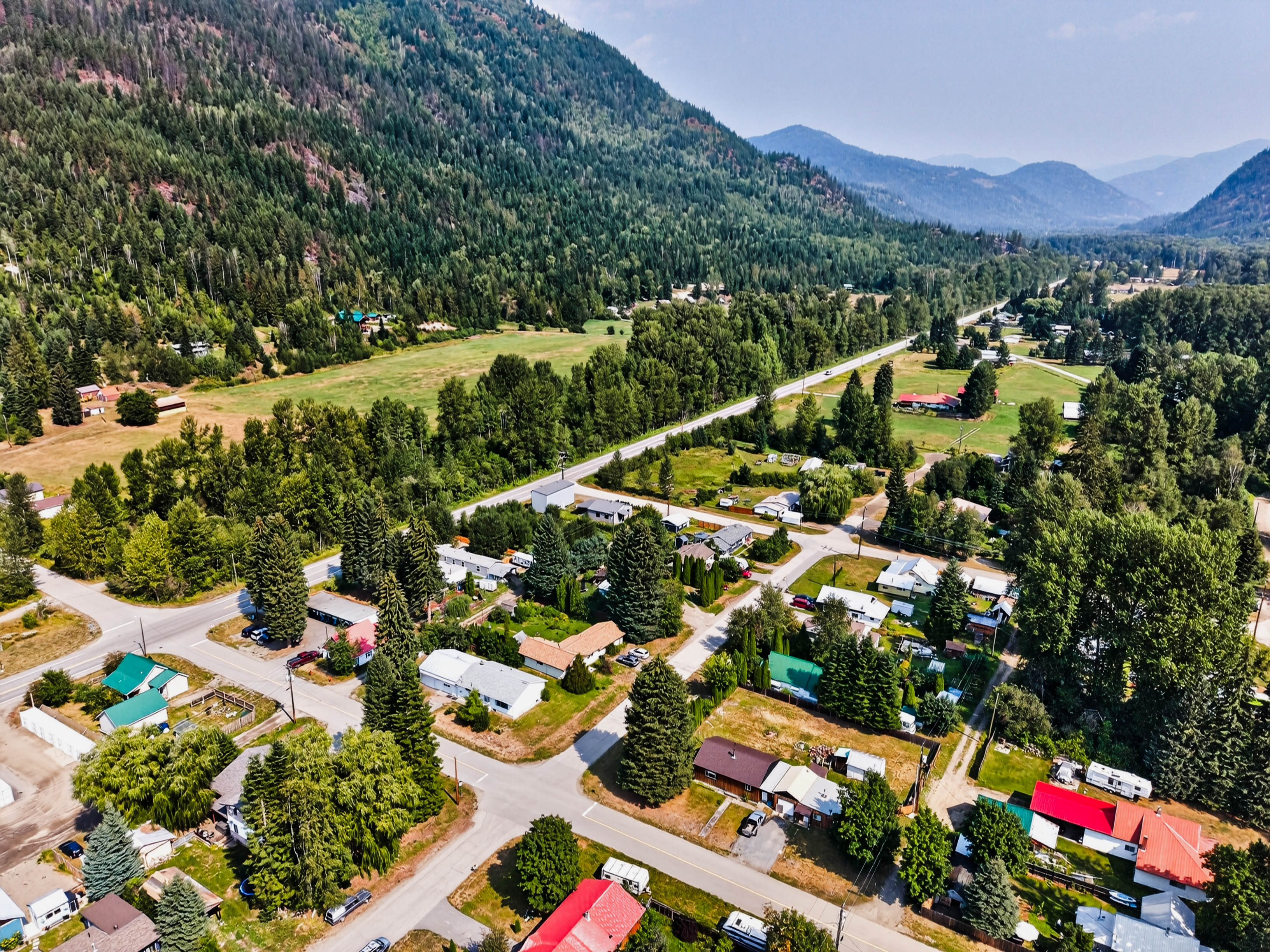 Aerial view across Salmo and the surrounding mountain valley