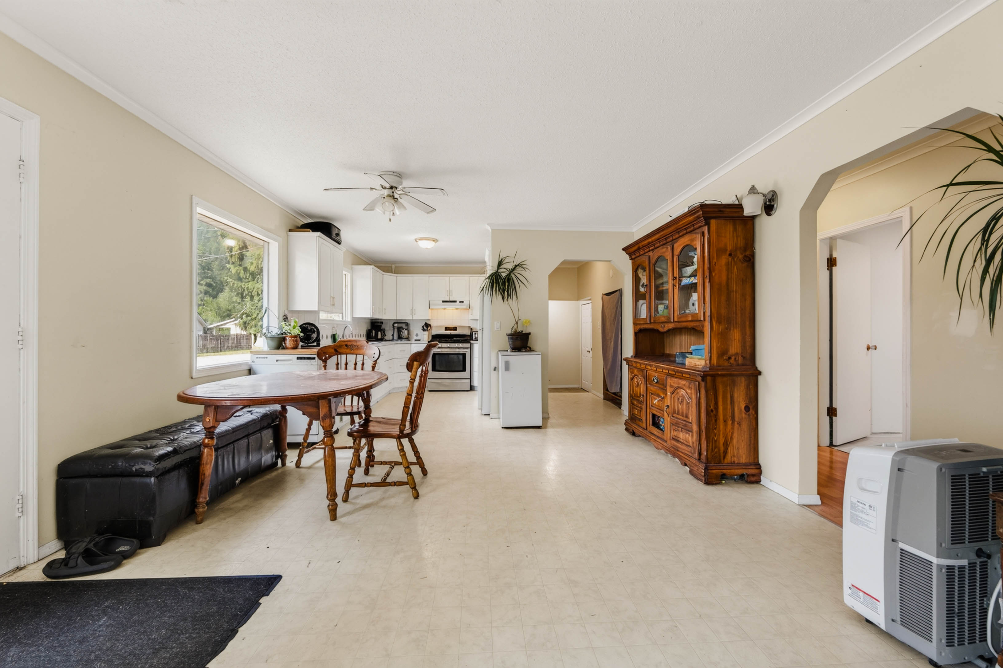 Dining area connected to the kitchen and hallway