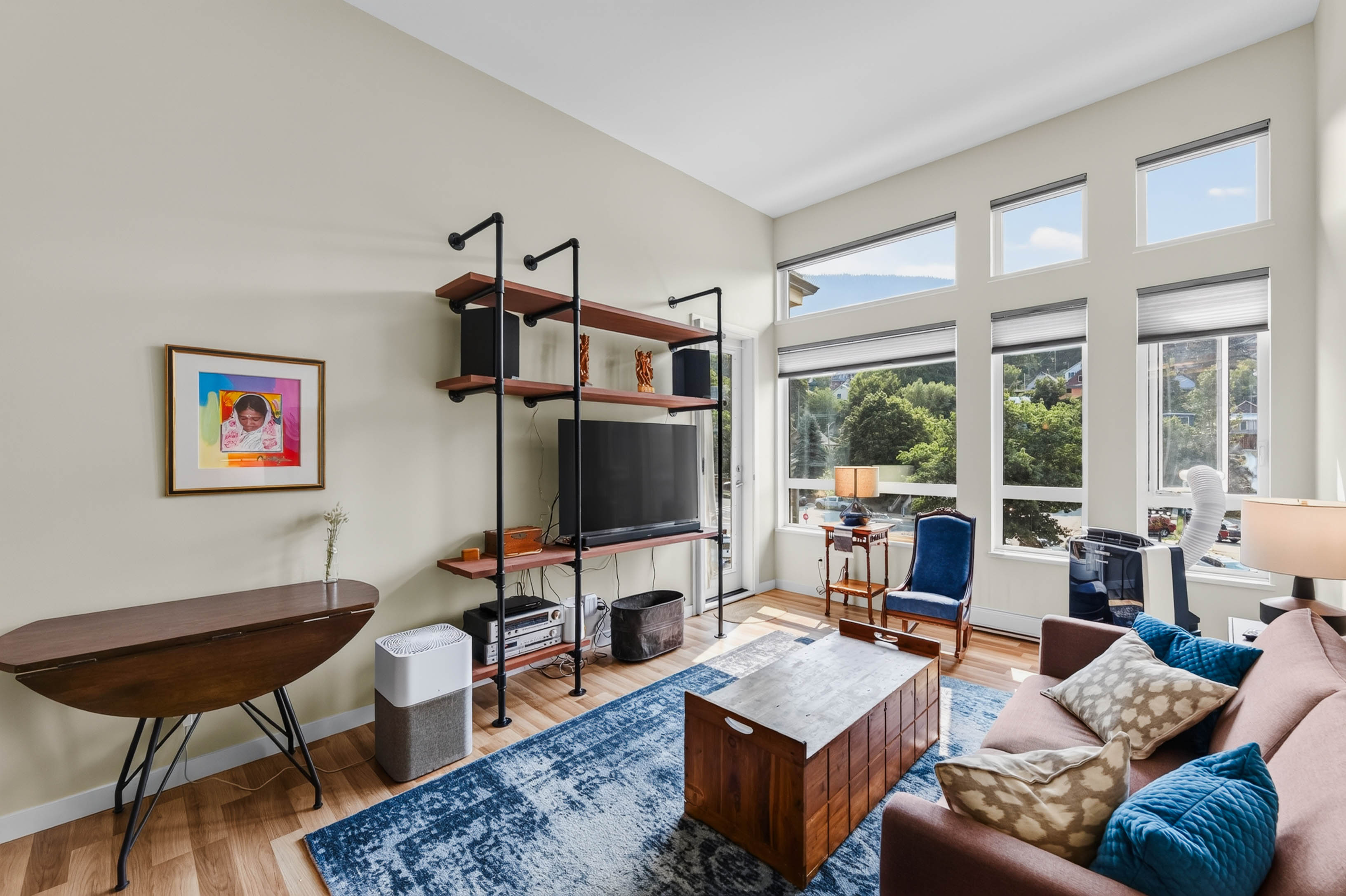 Bright top floor living room at Unit 408 Nelson Commons in Nelson BC