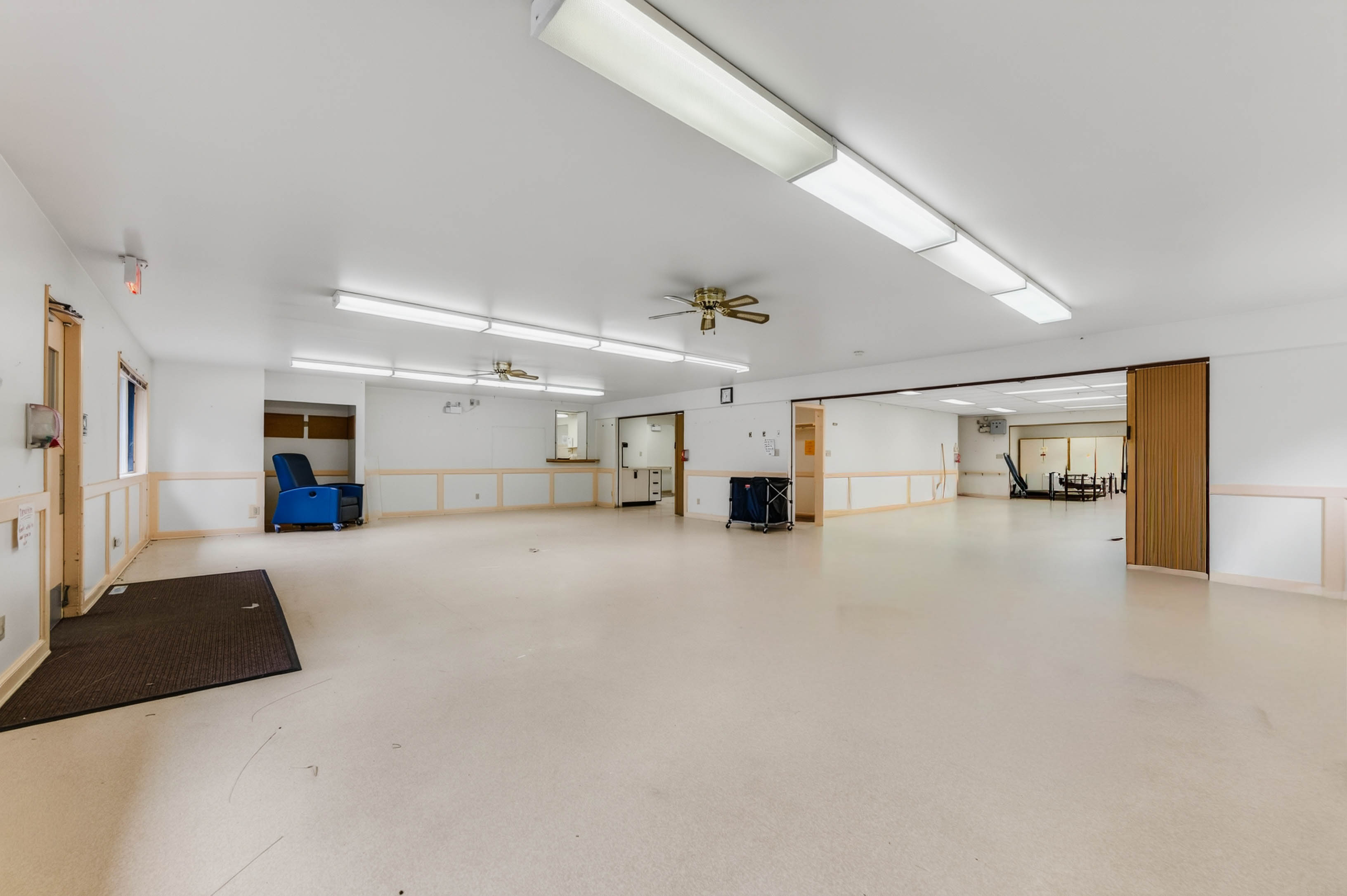 Large open interior with adjoining space