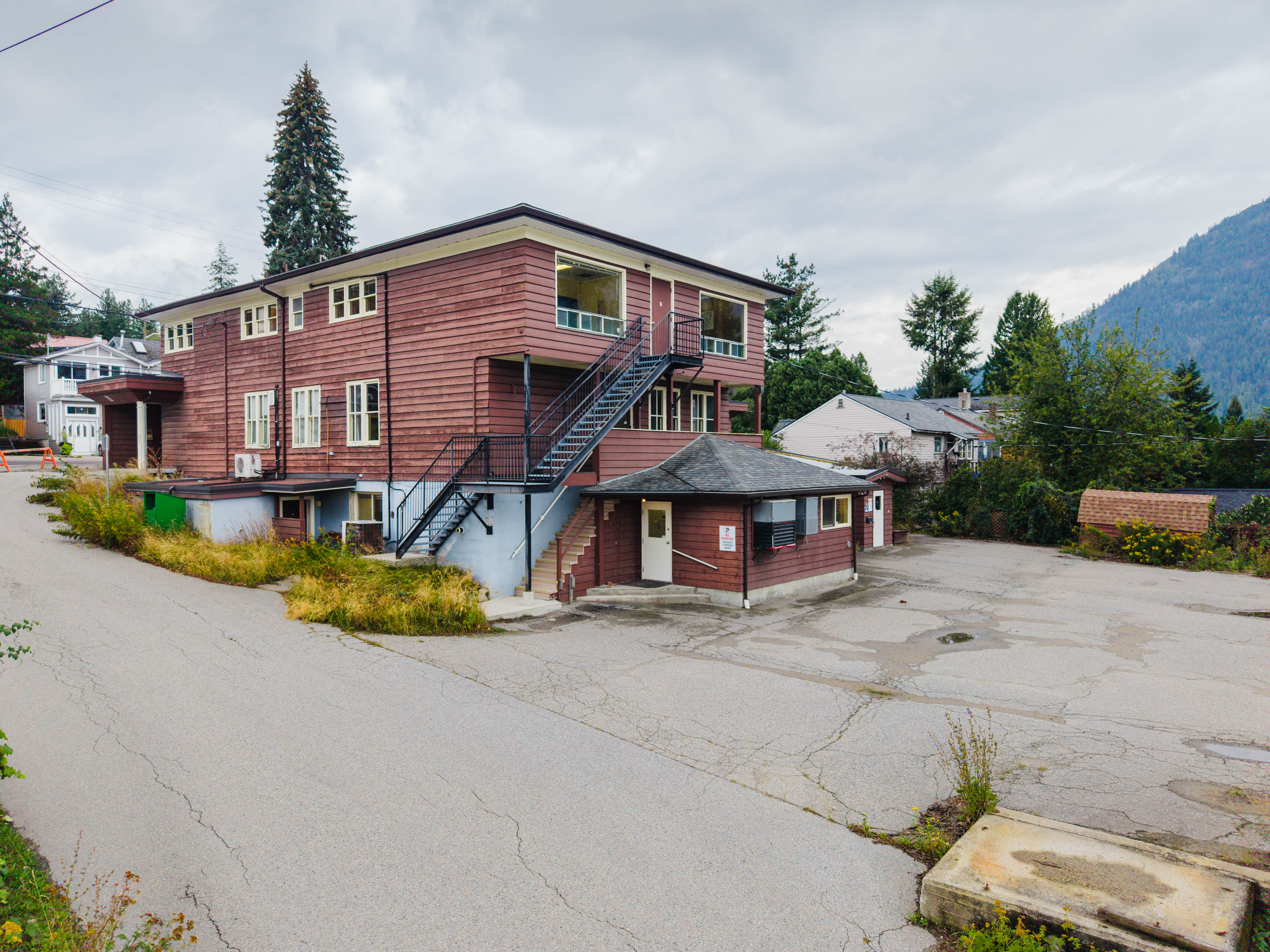 Side exterior of the building and adjoining paved areas
