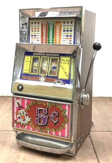 Three reels on a vintage slot machine