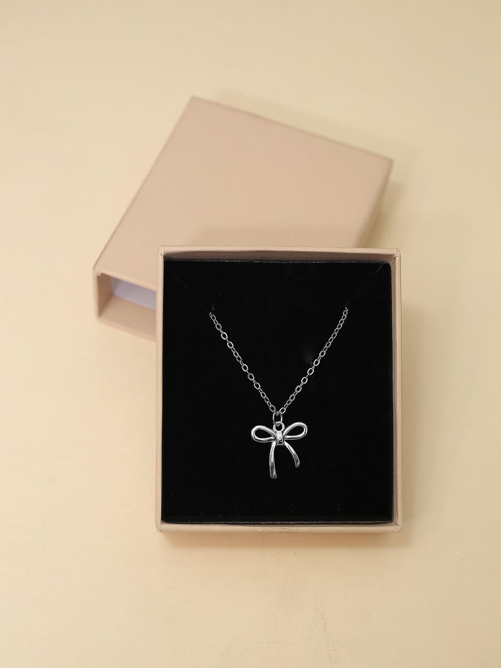 Shringarika Elodie Silver-Tone Bow Pendant Necklace, shop online in India