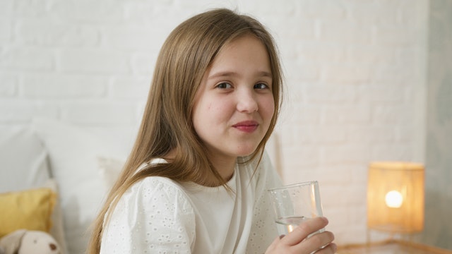 kid drinking water