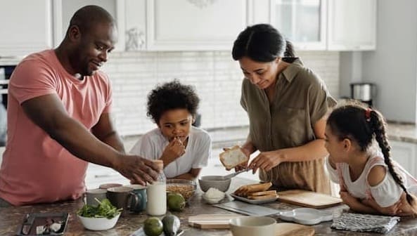 family enjoying cooking