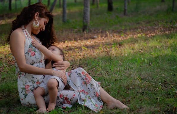 happy breastfeeding mother