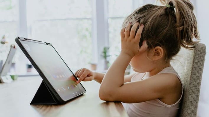 child using digital device