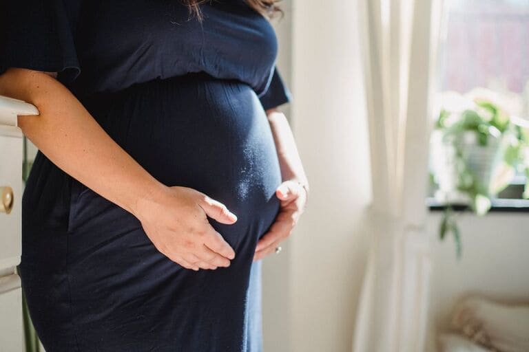 pregnant woman in blue
