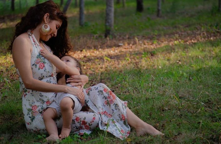 happy breastfeeding mother