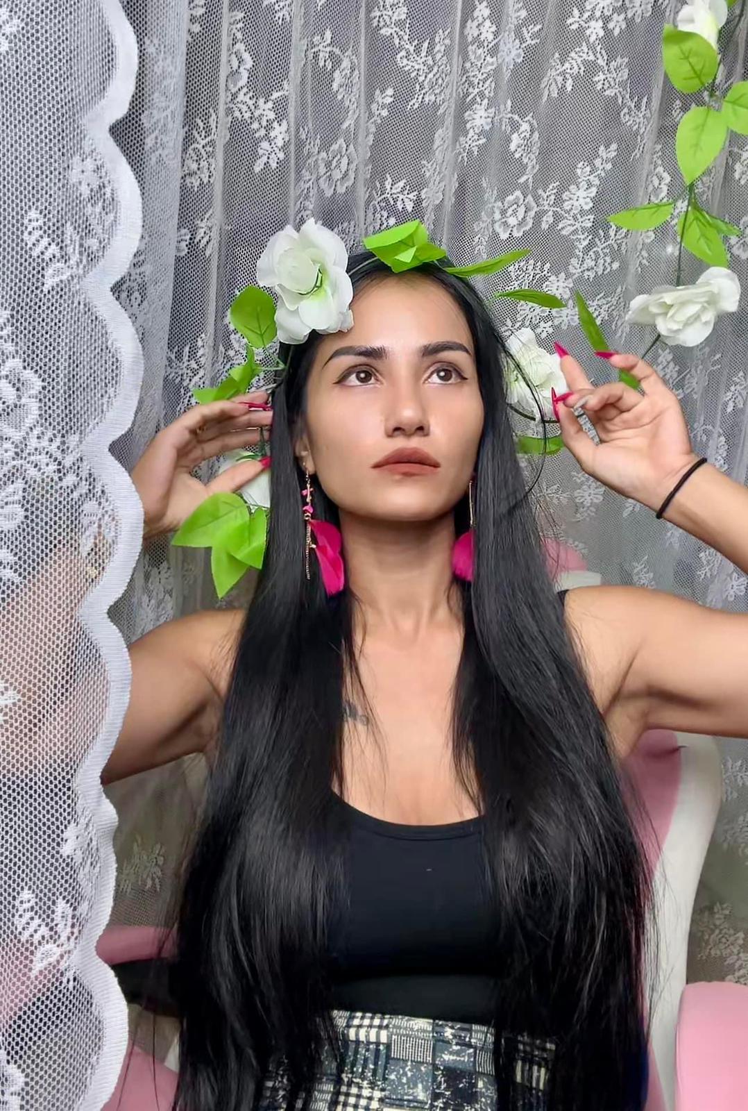 Yupa showcasing her fashion style with a beautiful flower in her hair, Thai beauty influencer in Hua Hin