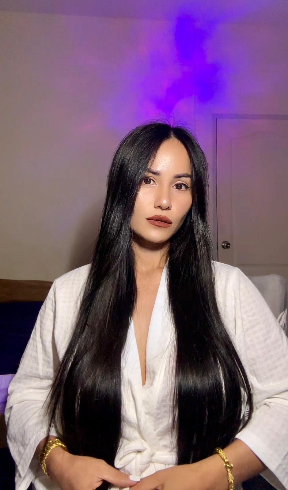 Yupa's elegant look in a white robe, luxury spa and beauty