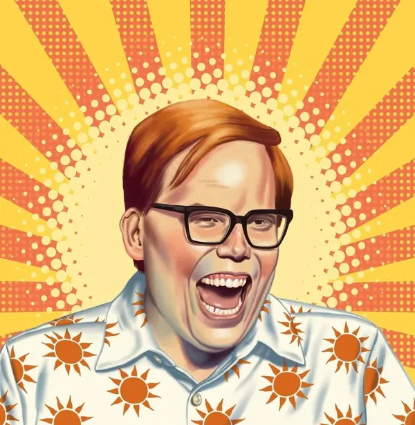 Portrait of Jeff Hiller laughing wearing a shirt with a pattern of suns.
