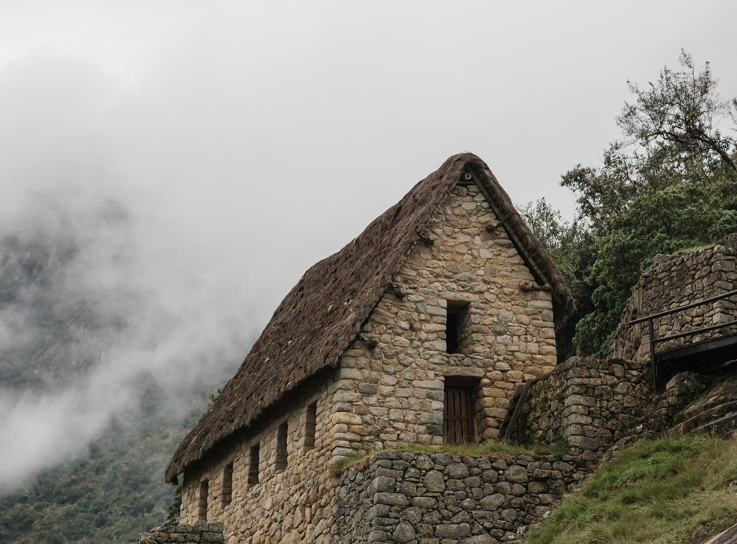 Machu Picchu citadel emerging from morning clouds above the Urubamba valley