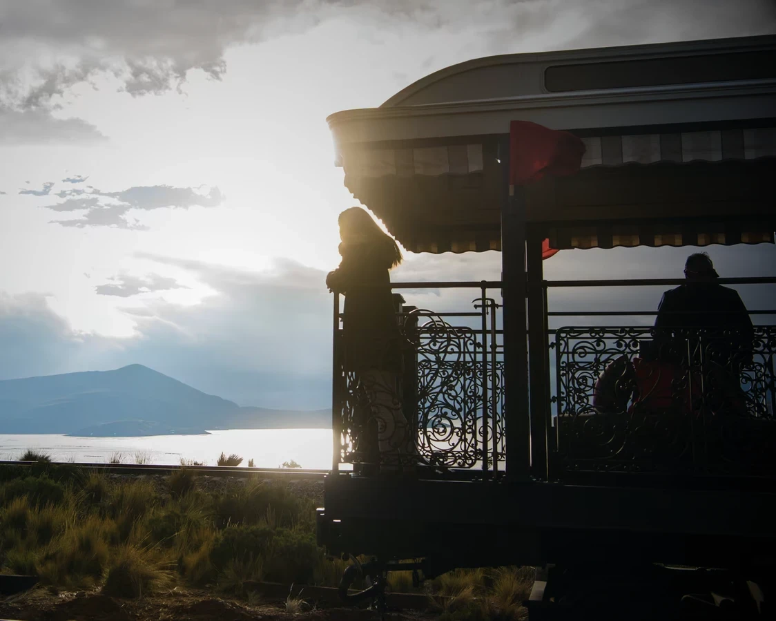 Lake Titicaca at golden sunset with reed totora boats