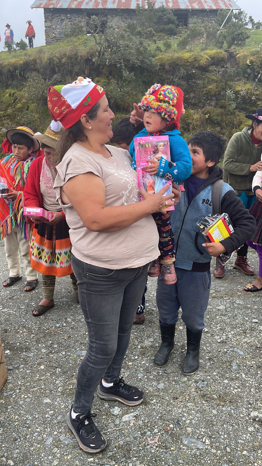 A mother and child receiving a donation