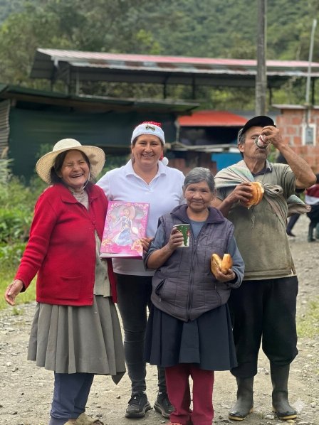 The Magna team sharing gifts with an Andean family