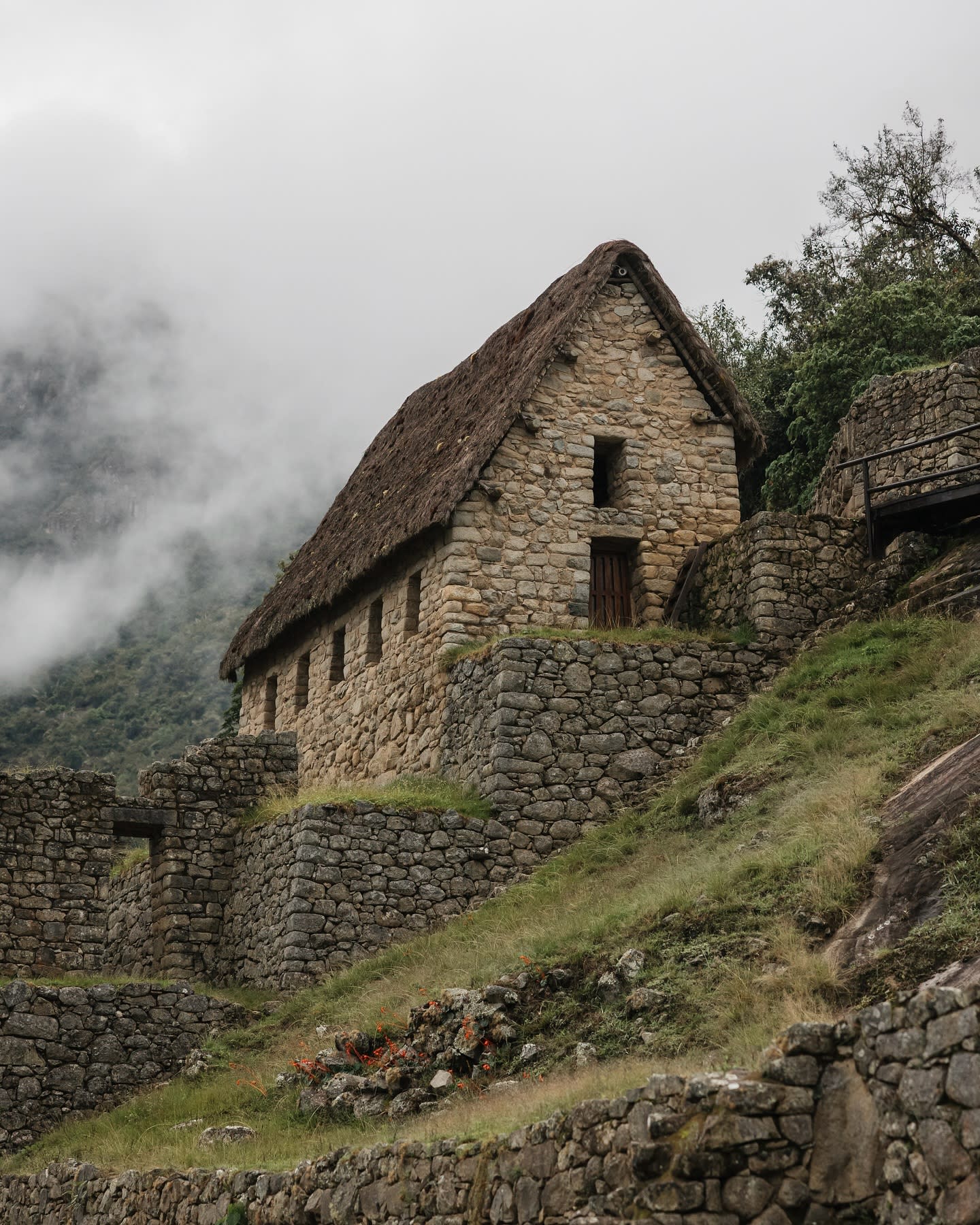 Machu Picchu ruins under dramatic Andean sky