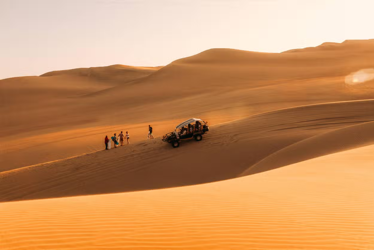 Huacachina oasis surrounded by sand dunes, Ica