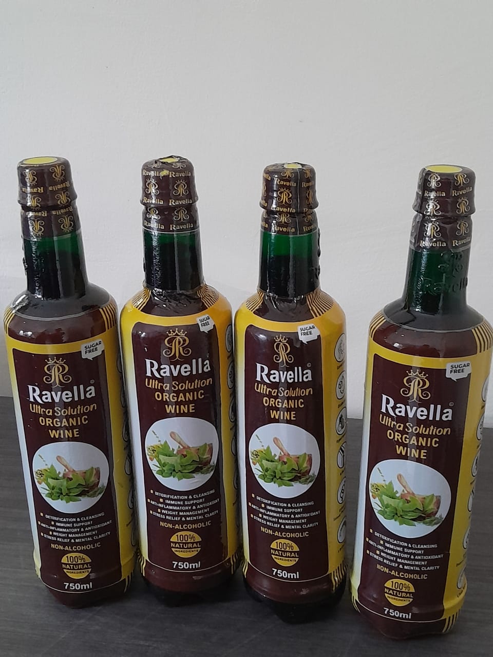 Four bottles of Ravella Ultra Solution Organic wine — on xHerbs Store Nigeria