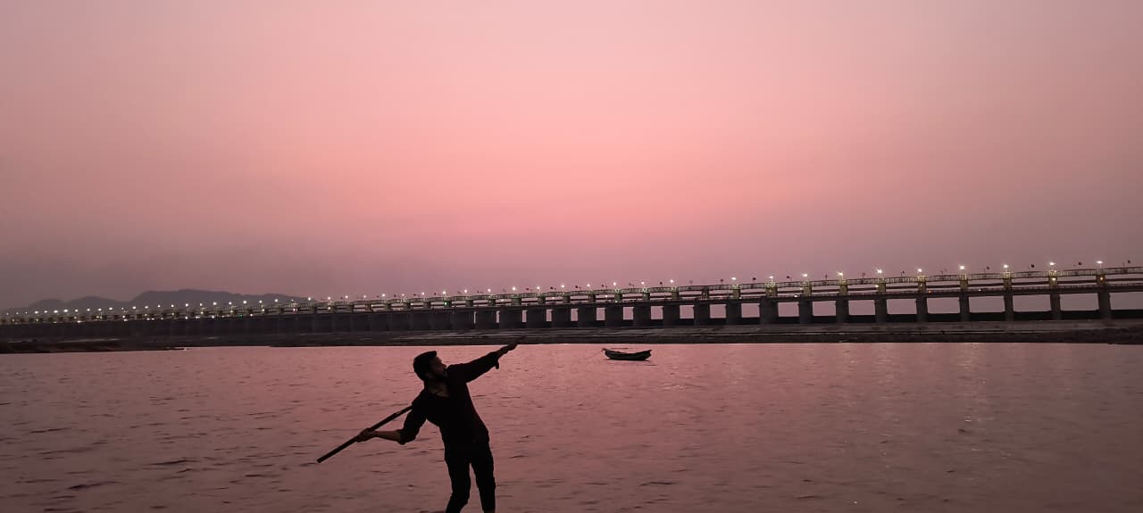 Prakasam Barrage shines brilliantly across Krishna River, defining Vijayawada’s timeless beauty.
