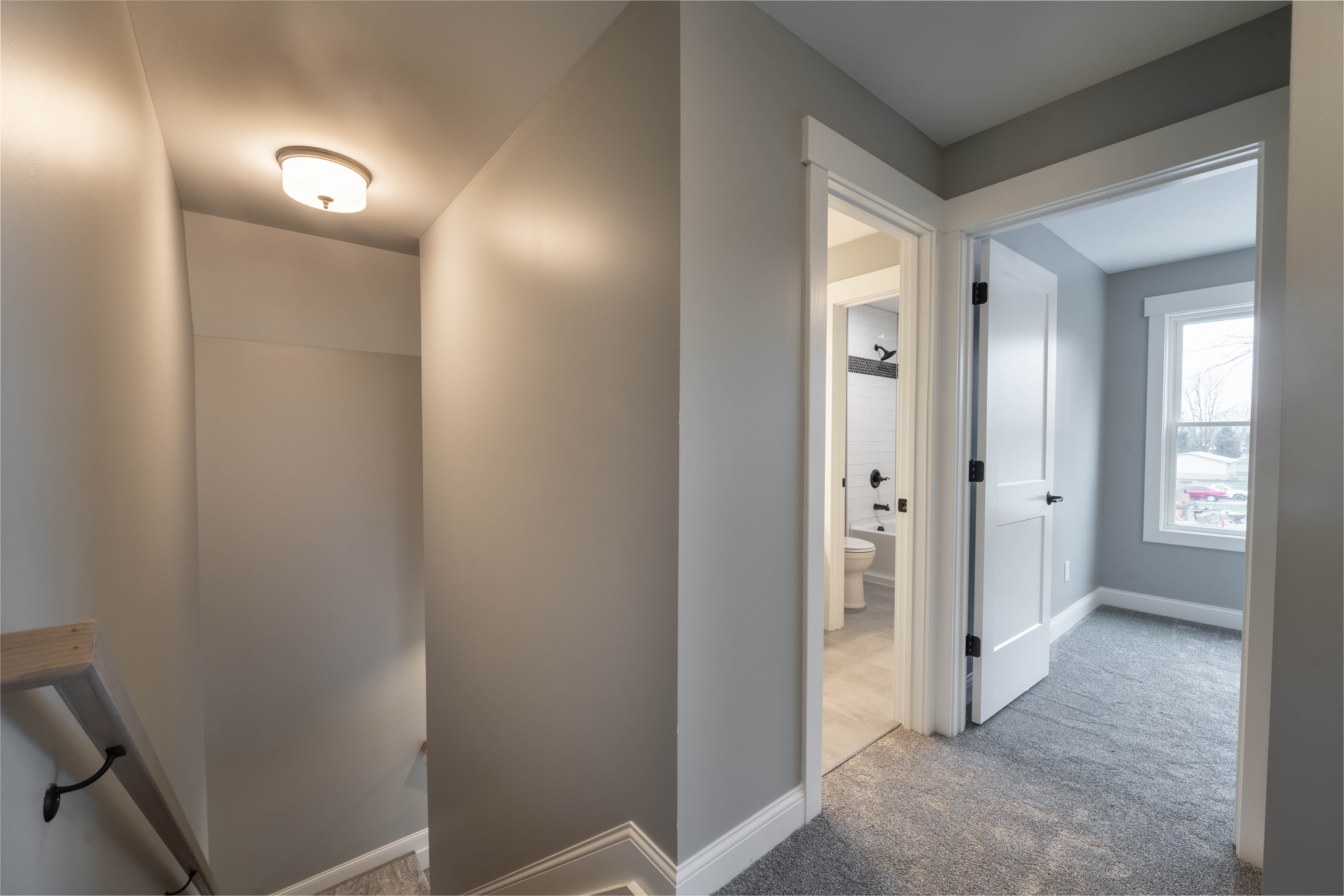 Master closet with built-in shelving in Alice residence