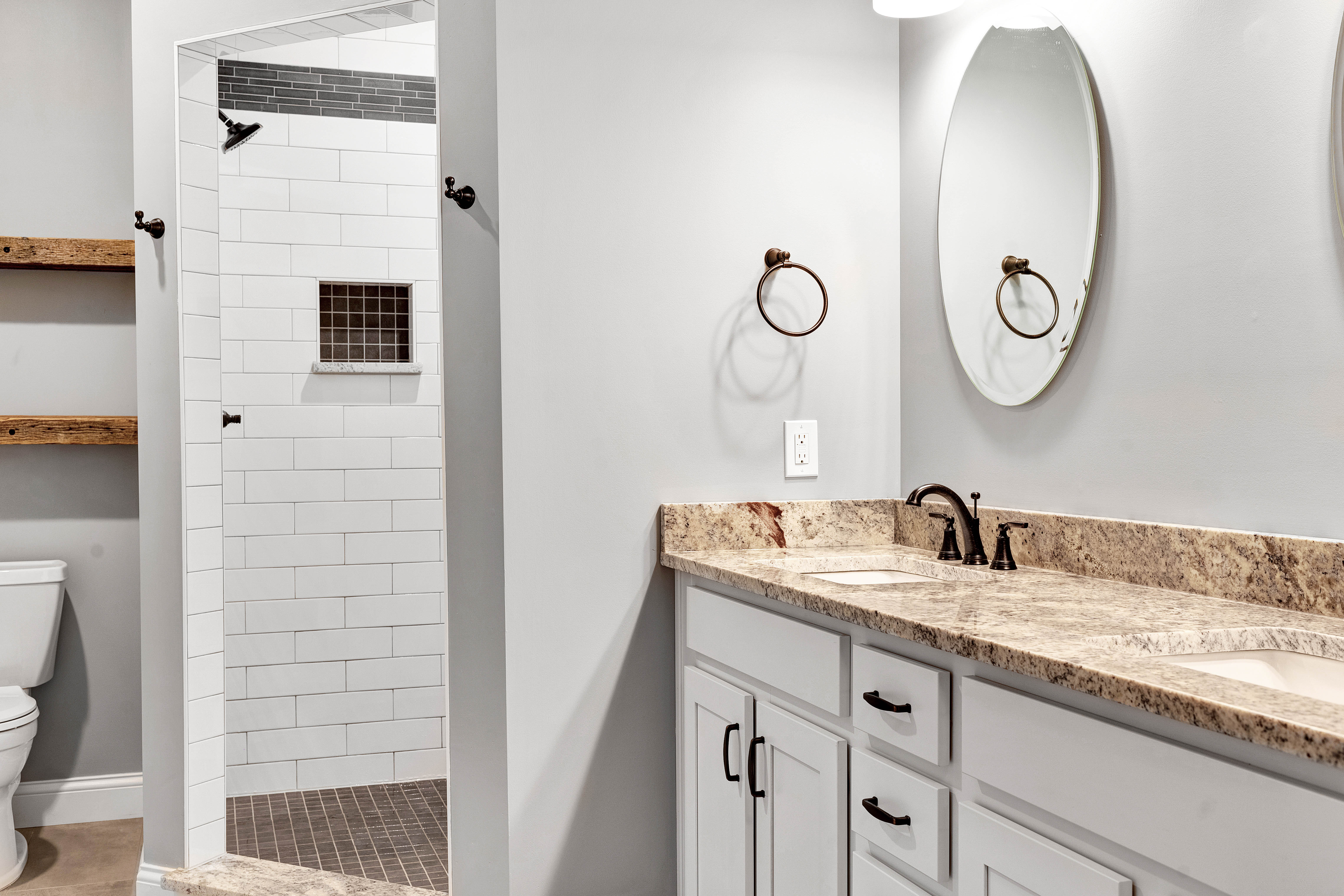 Mudroom with storage and bench in Alice residence