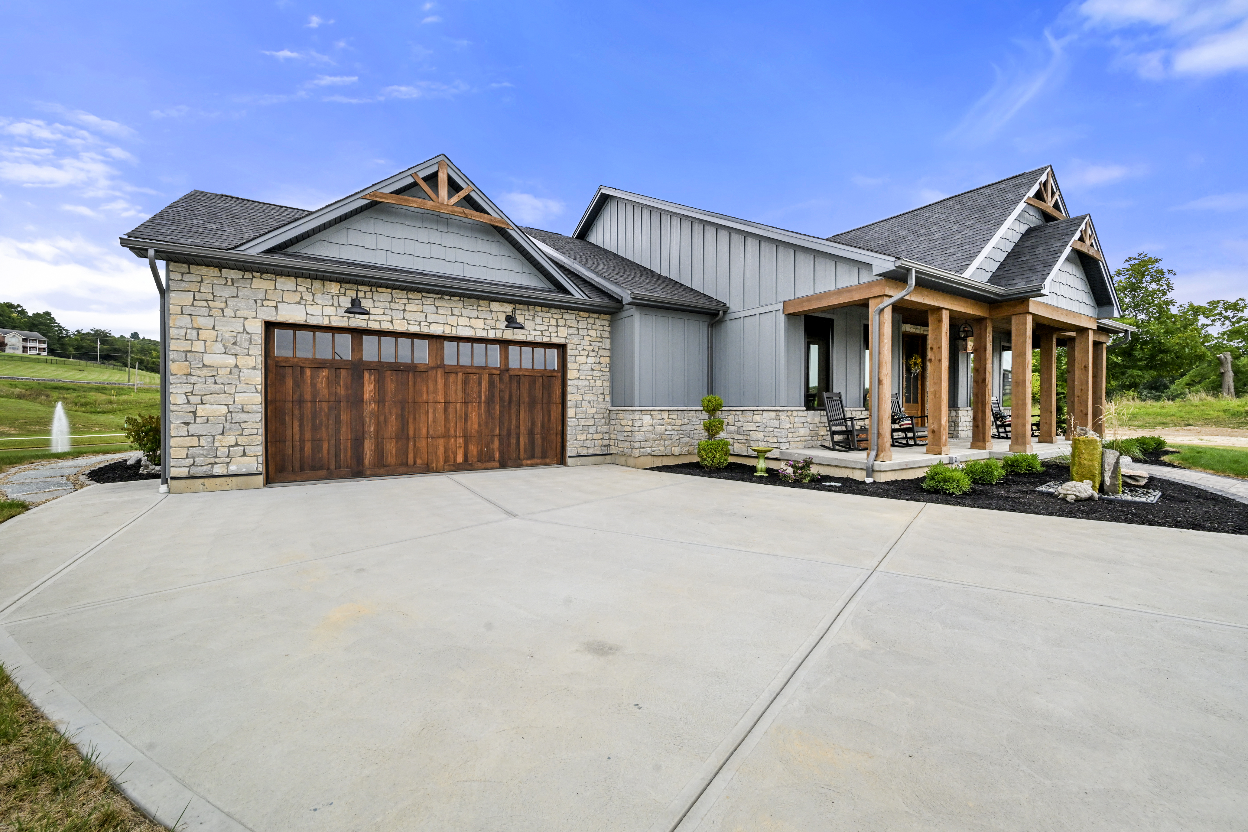 Furnished basement living space in completed custom home