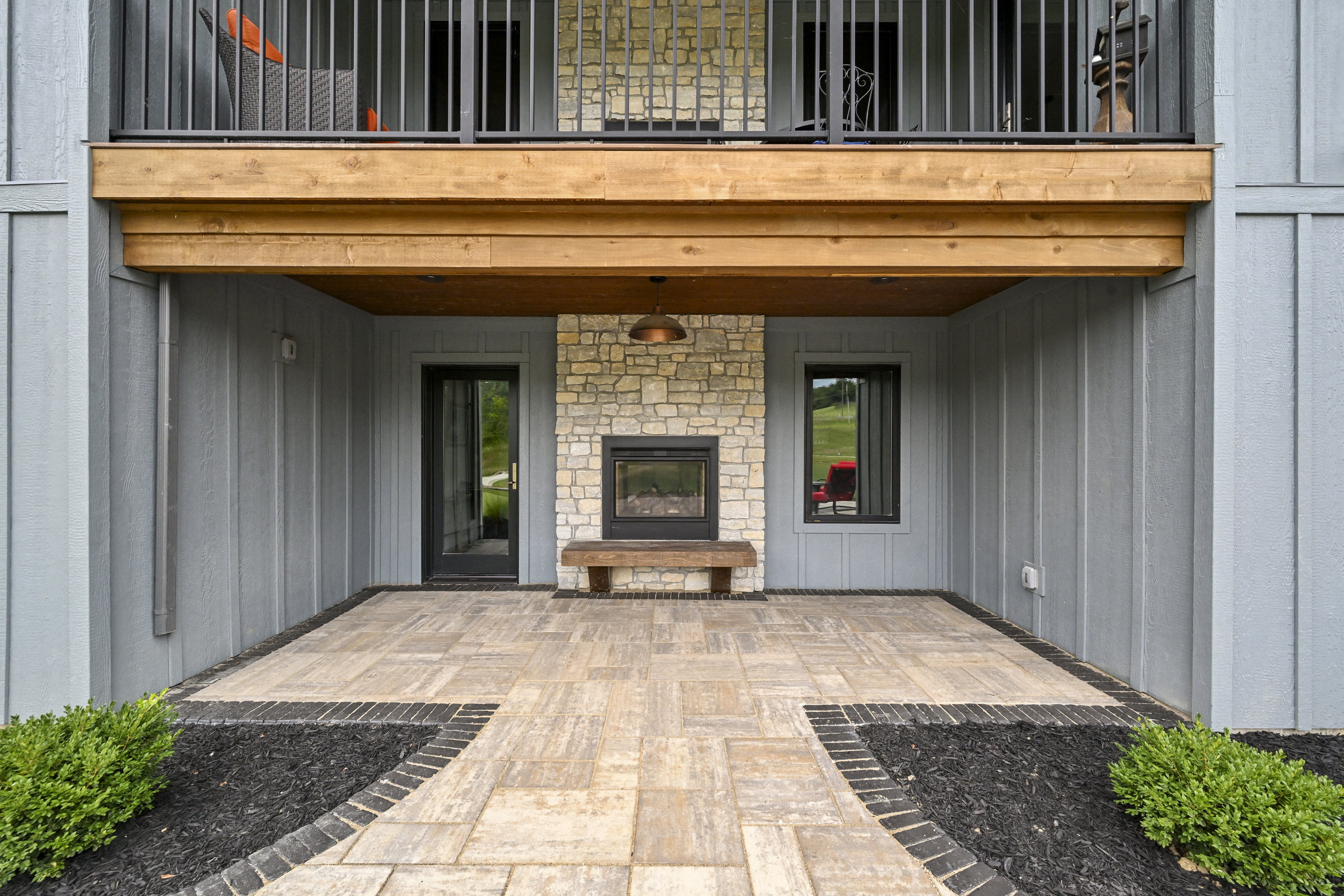 Final exterior with landscaping in completed Caudill custom home
