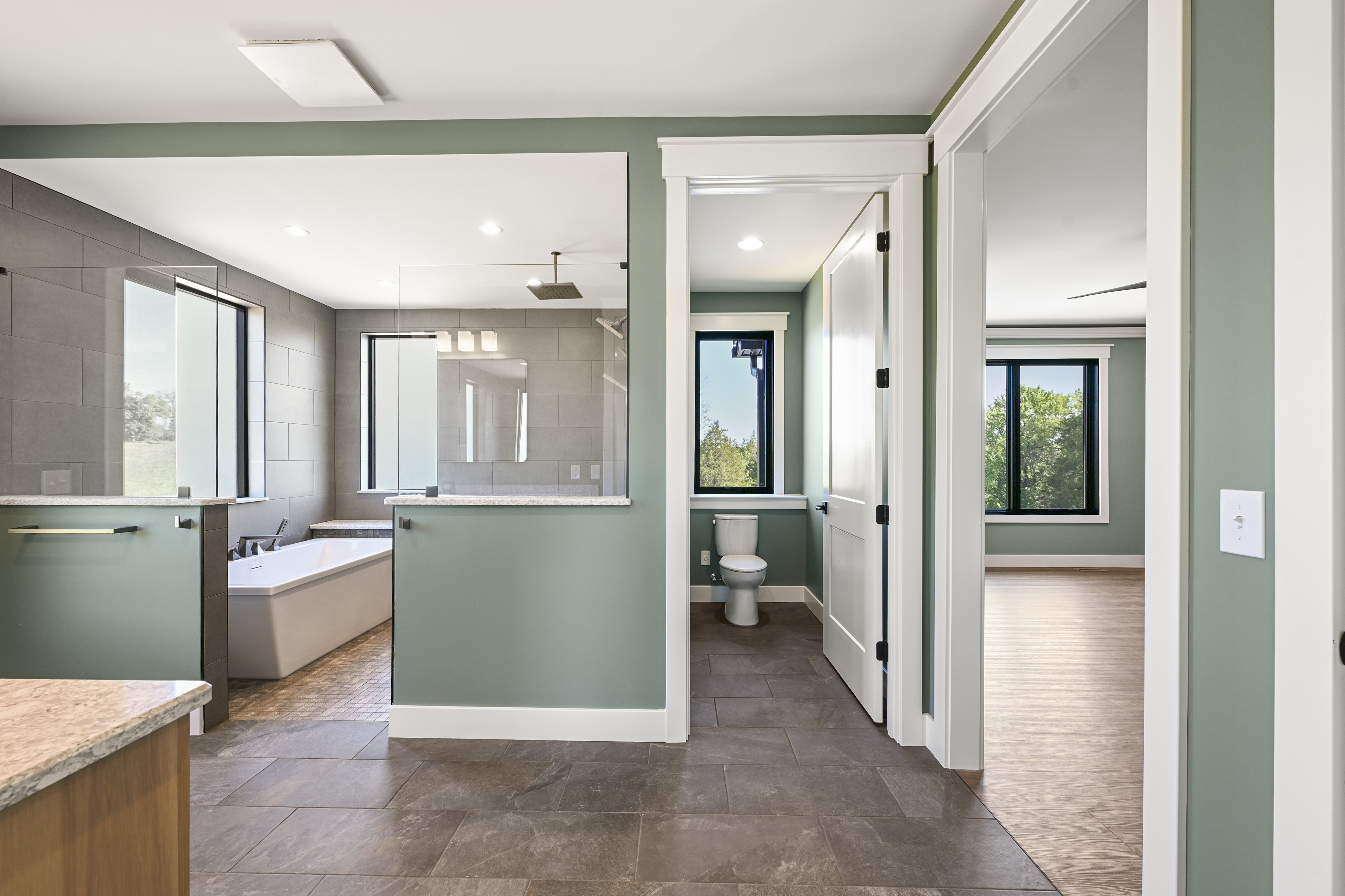 Updated guest bedroom in Drouge residence remodel