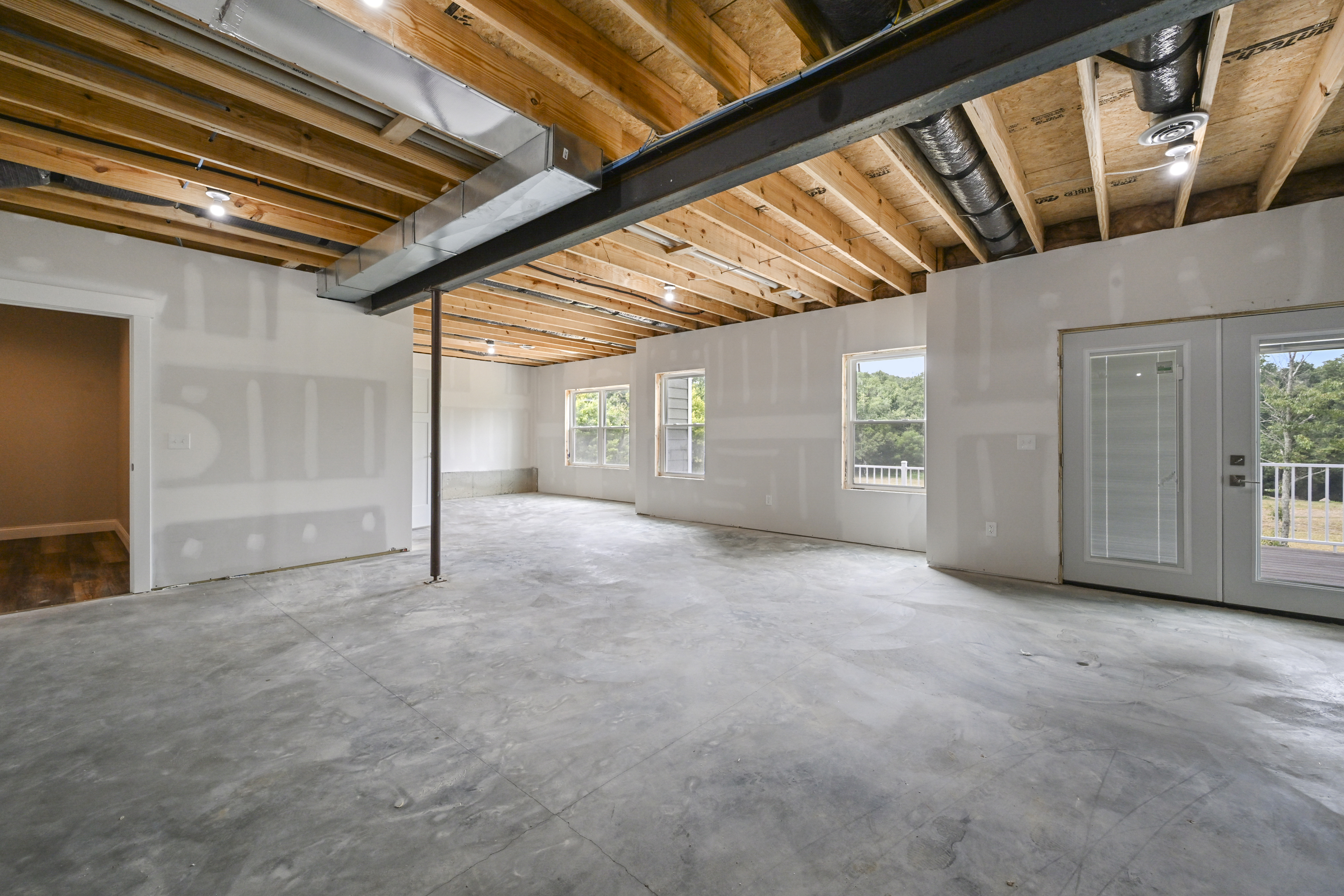 Rear deck and outdoor space at Larkin custom home