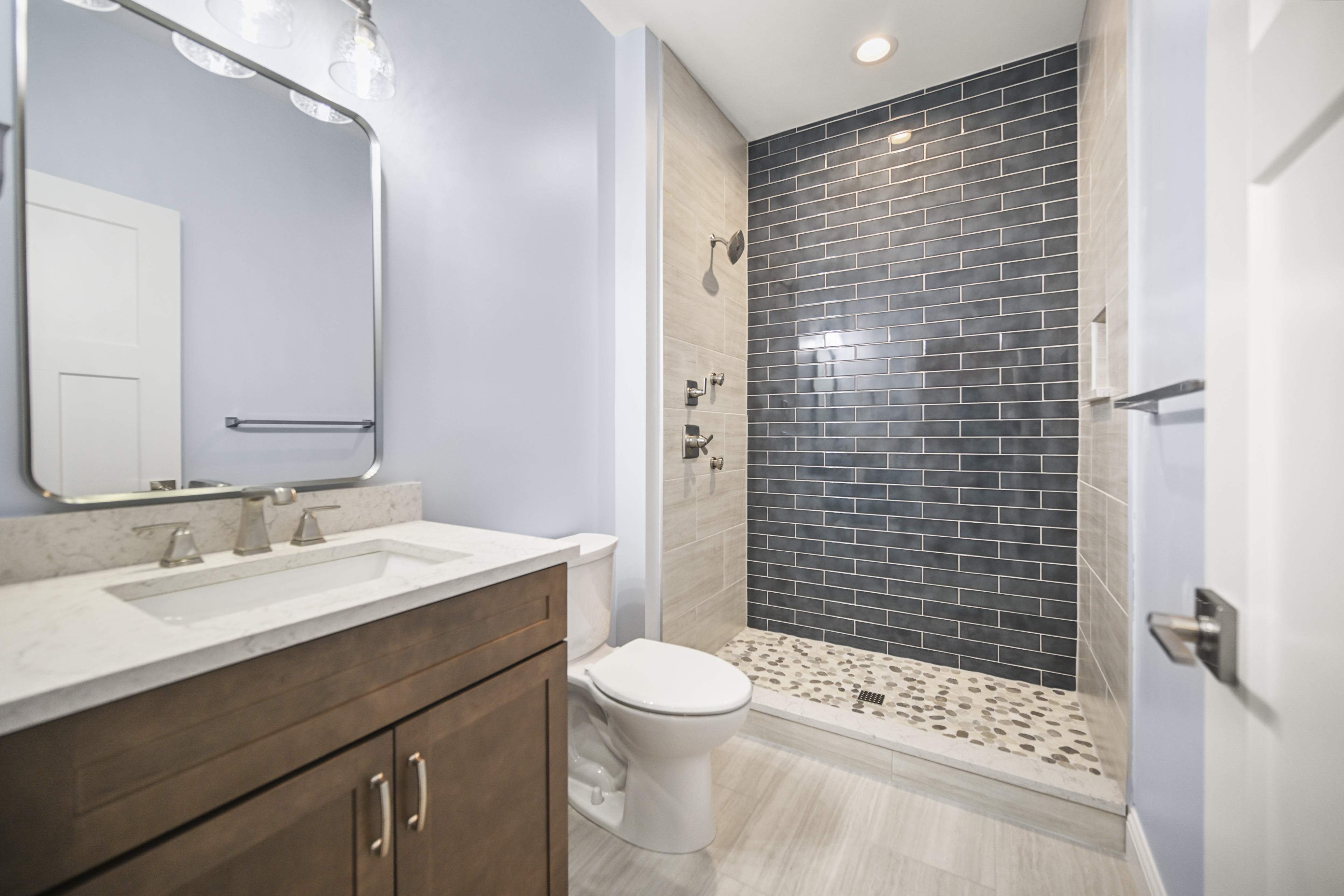 Master bathroom with soaking tub and tile surround