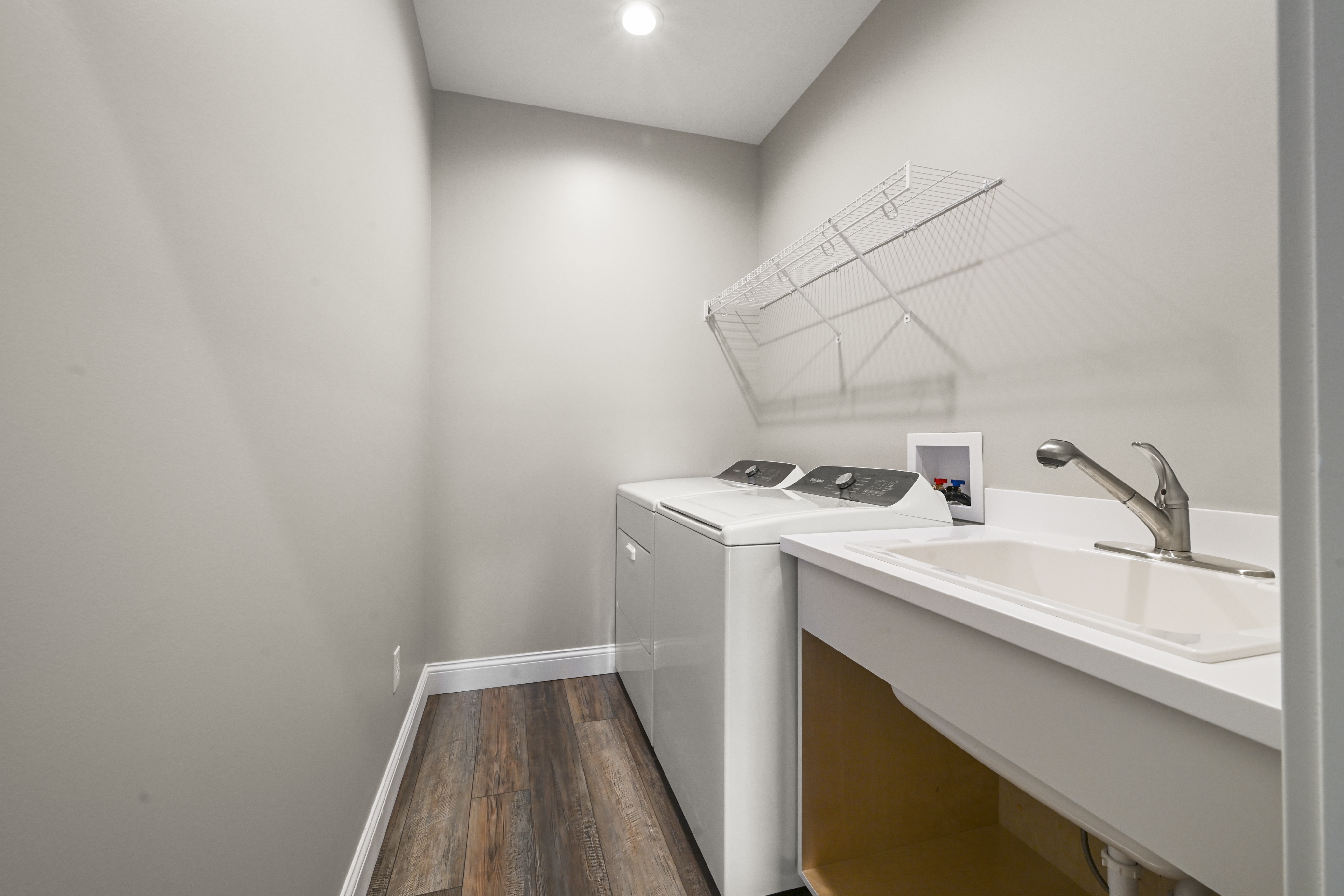 Home office with built-in desk and shelving