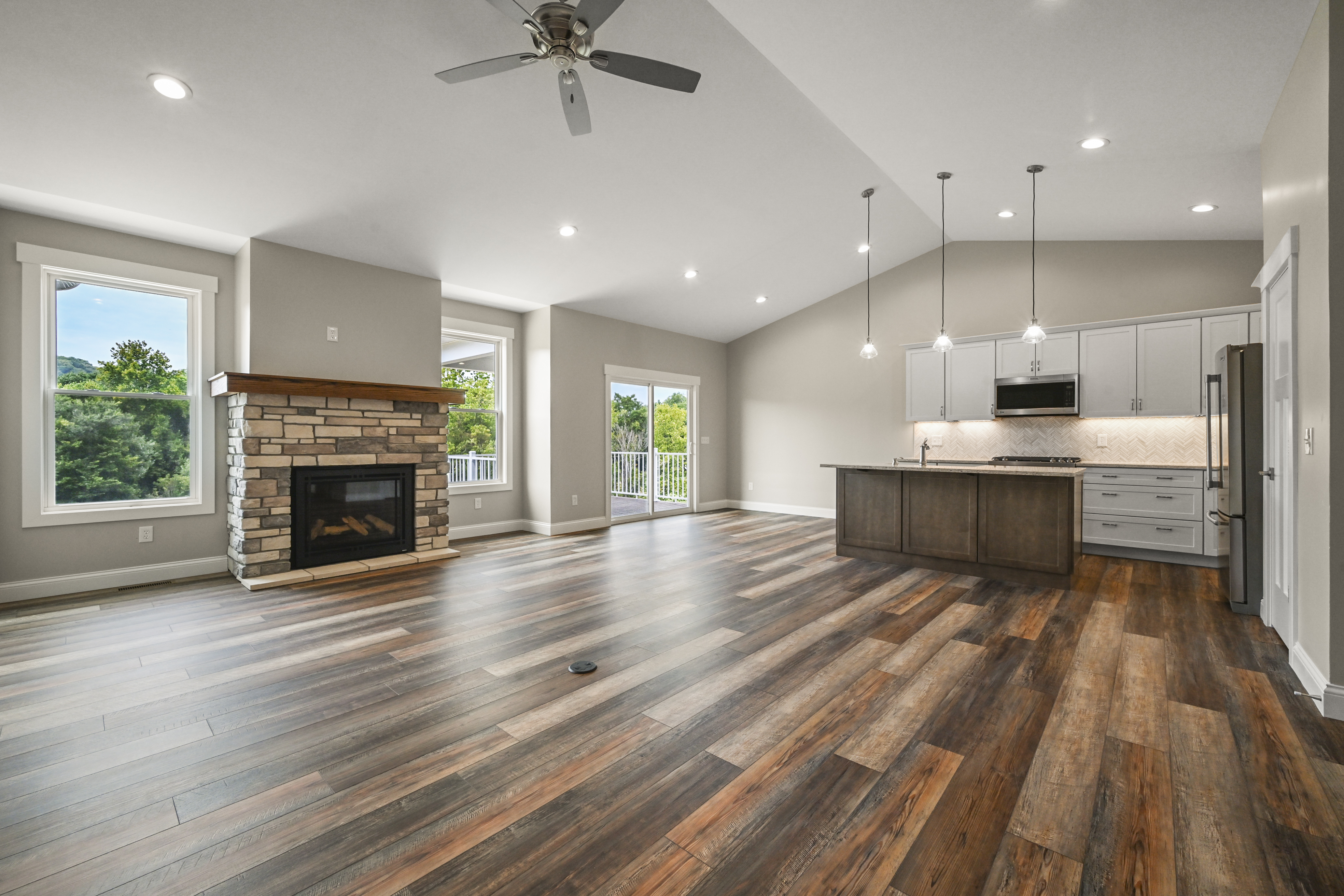 Finished basement with wet bar in custom home