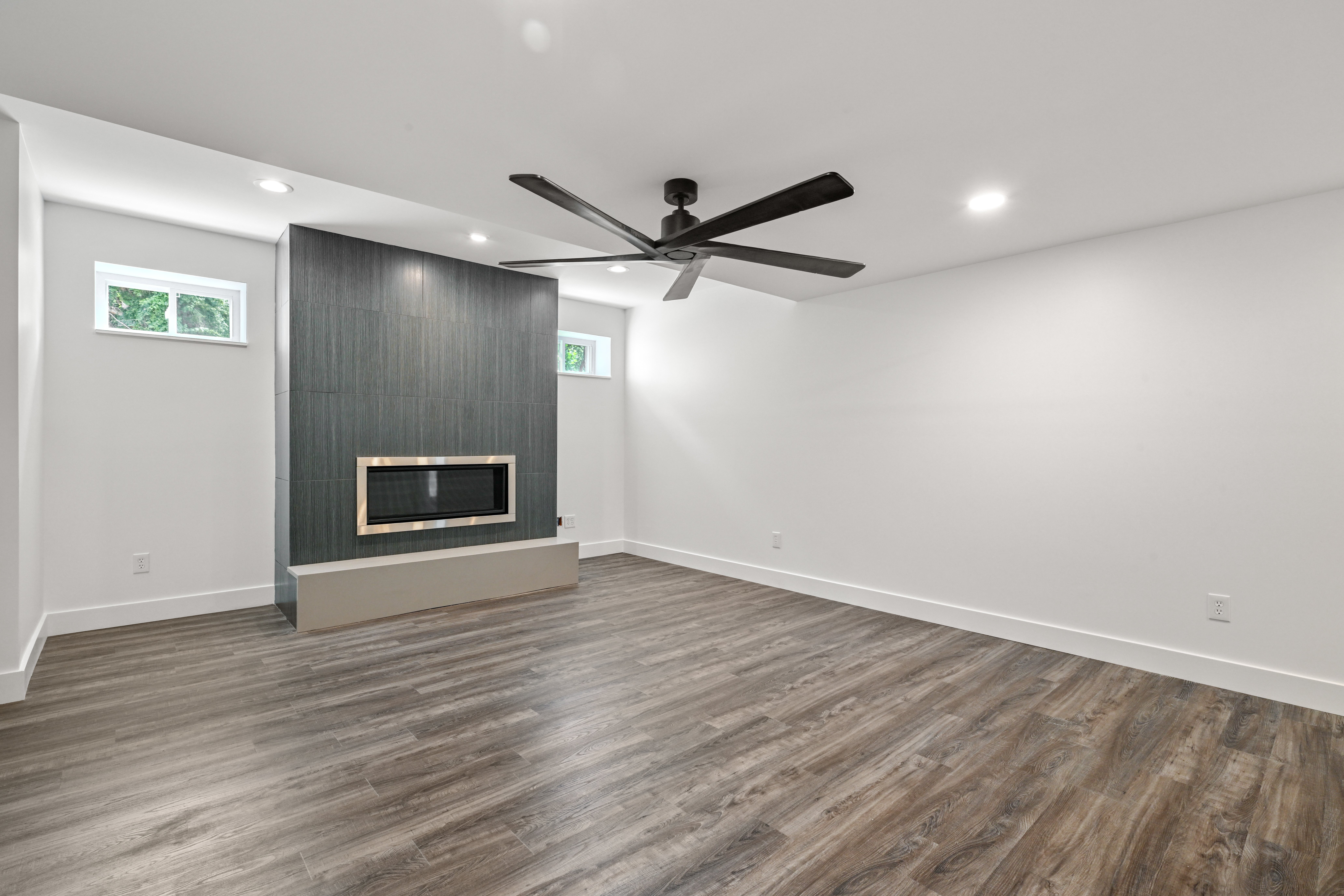 Finished basement family room in custom Indiana home