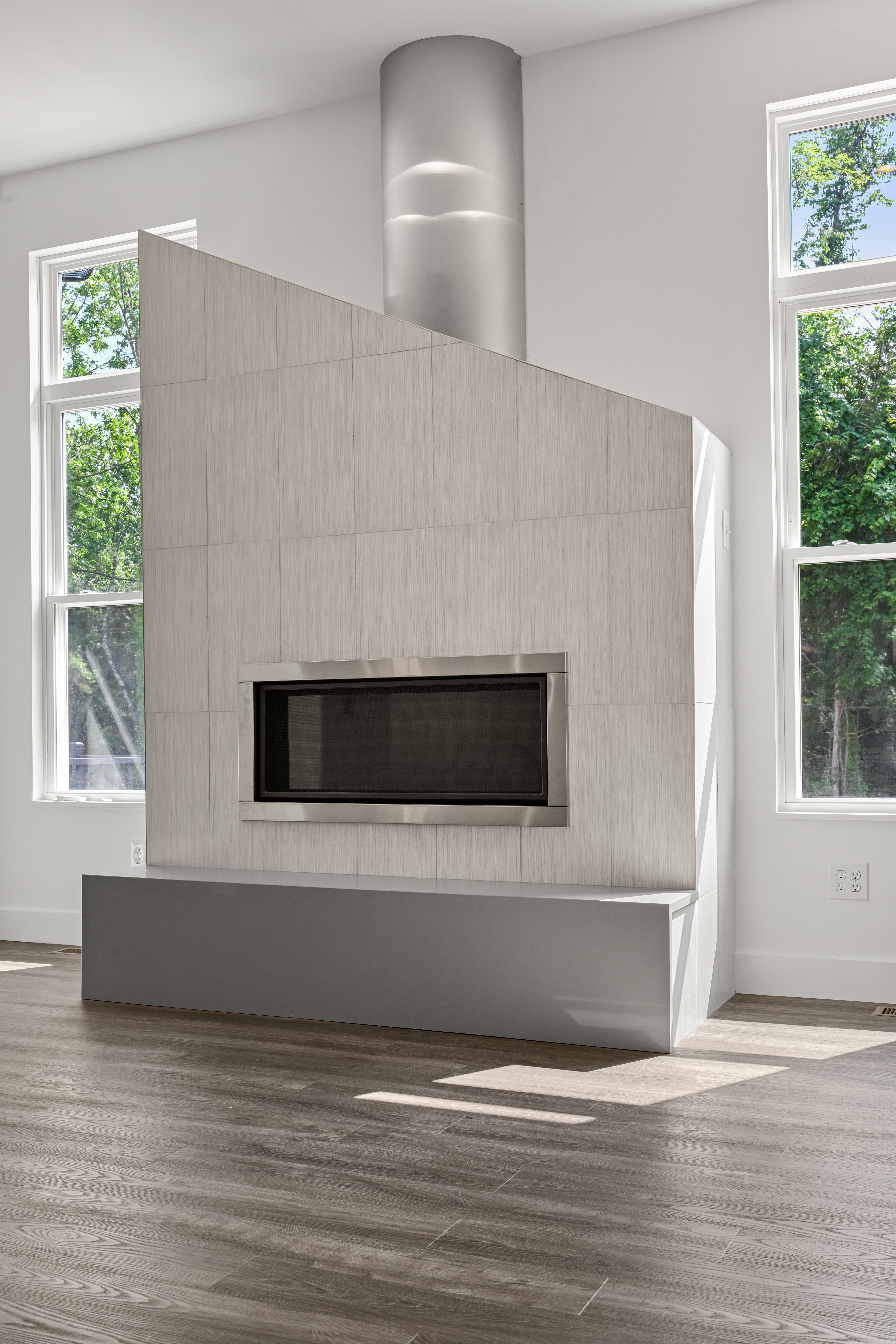 Designer light fixtures and finishes in Cameron home