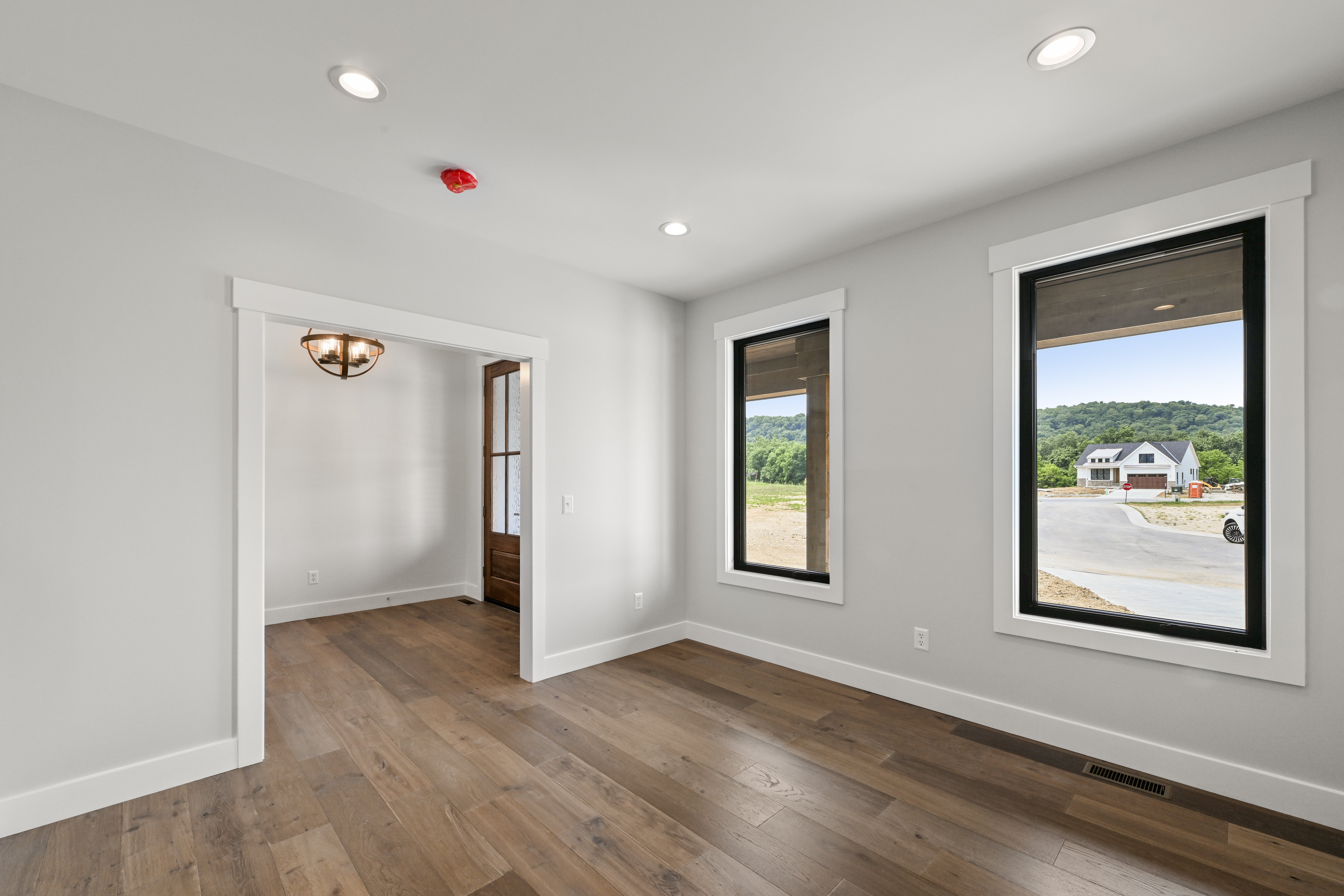 Covered front porch and entry of Caudill residence custom home