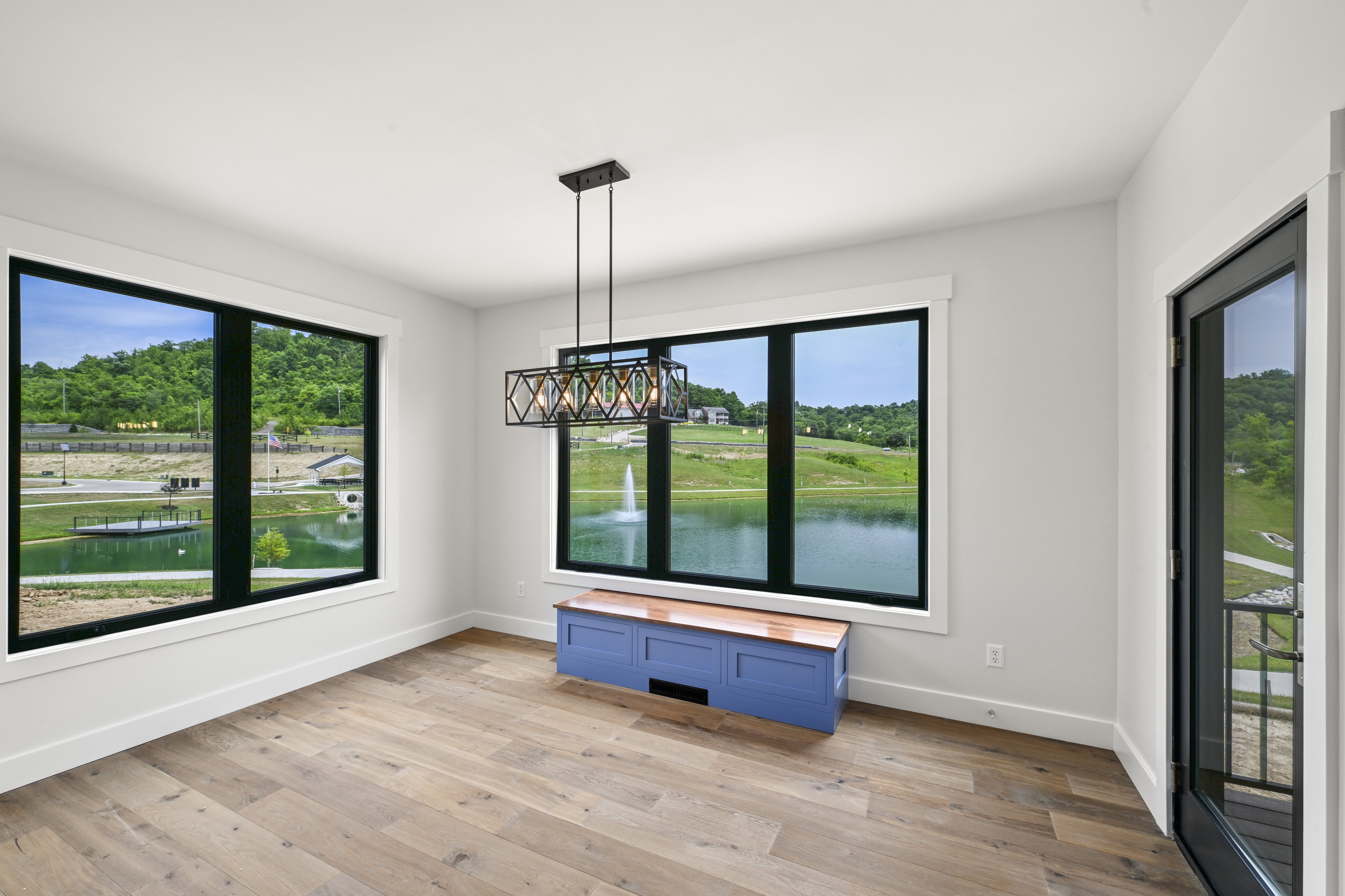 Kitchen pendant lights and island detail in custom home