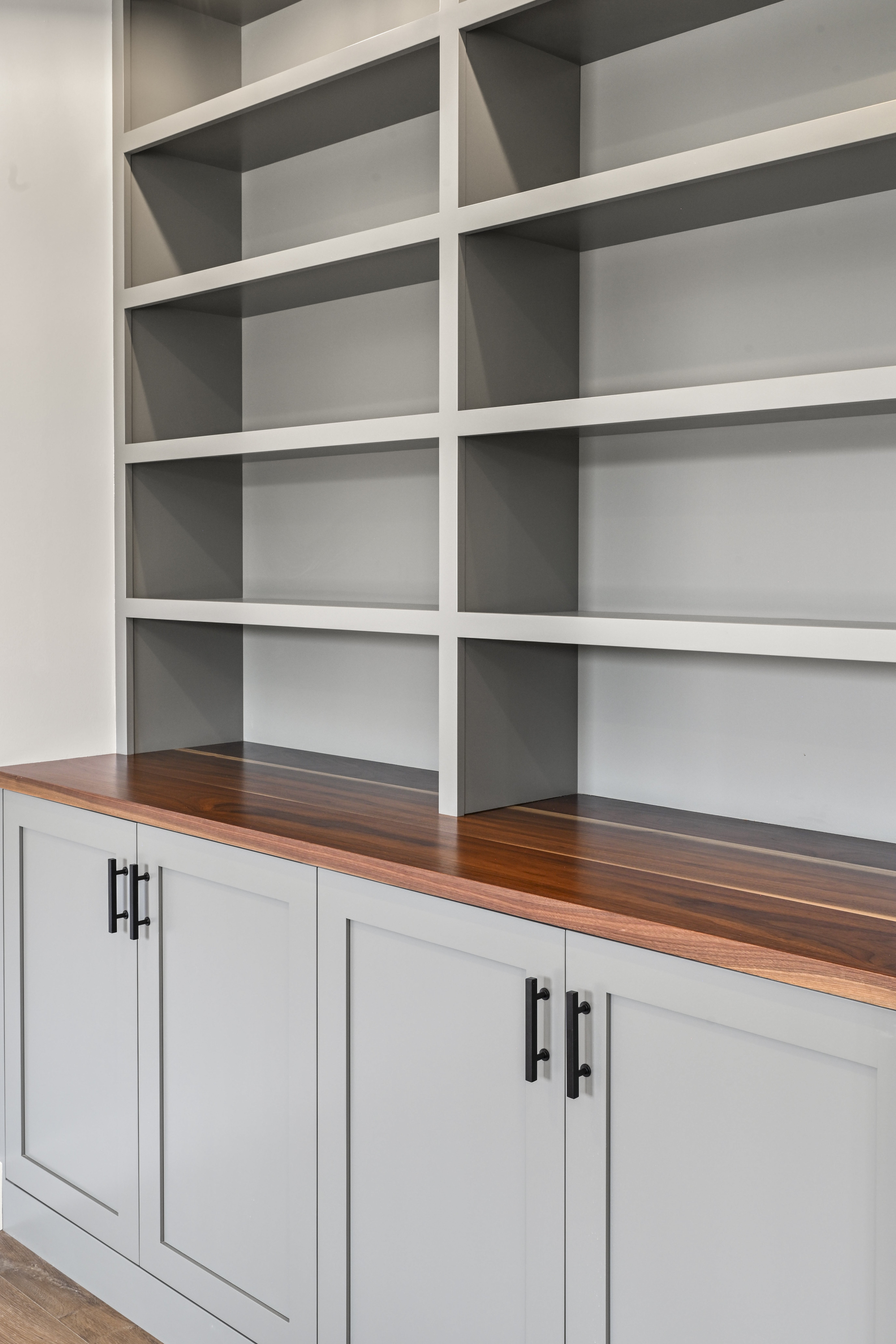 Hardwood floor inlay and transition detail in custom home