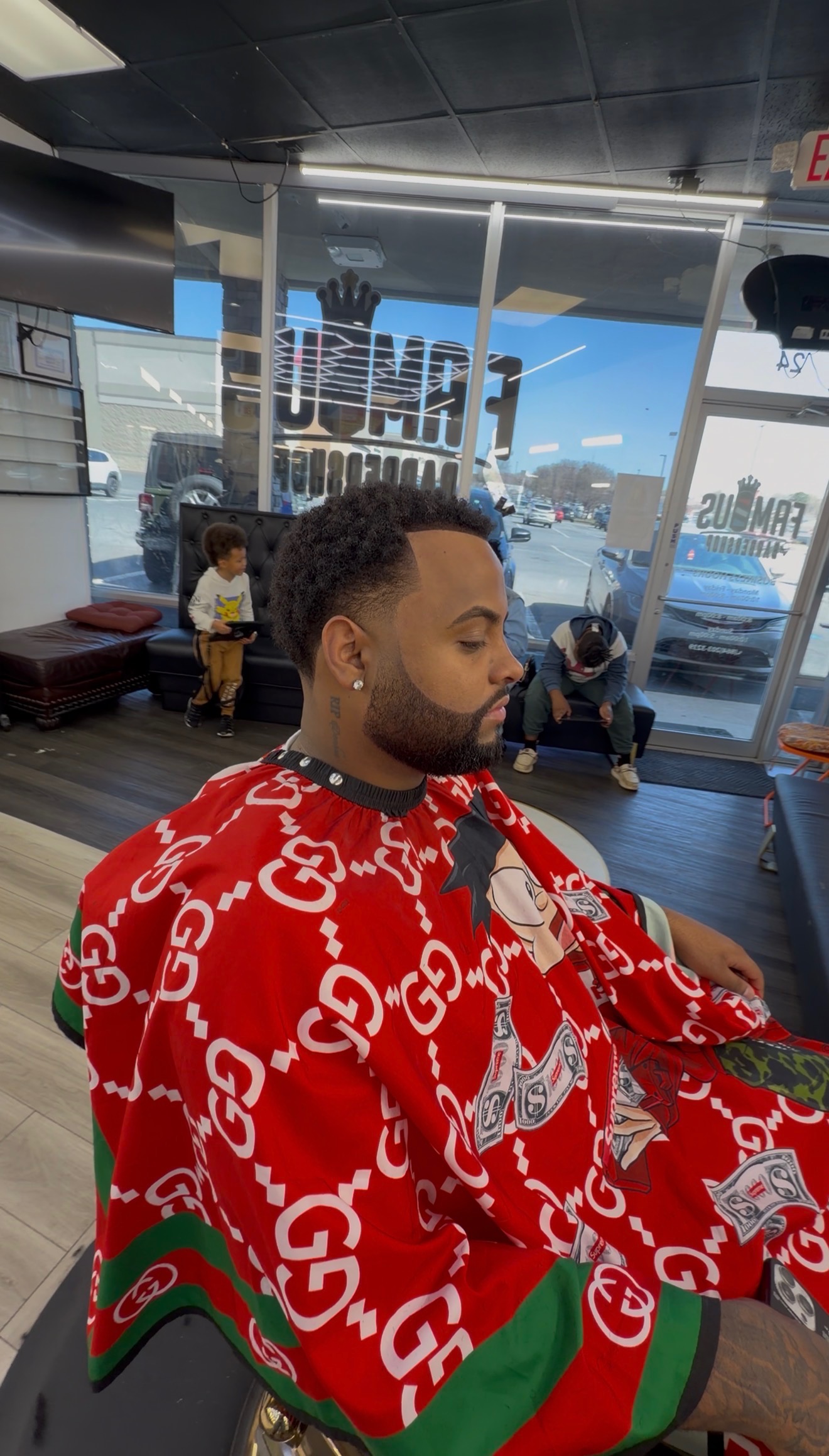 Customer style at Famous Barbershop