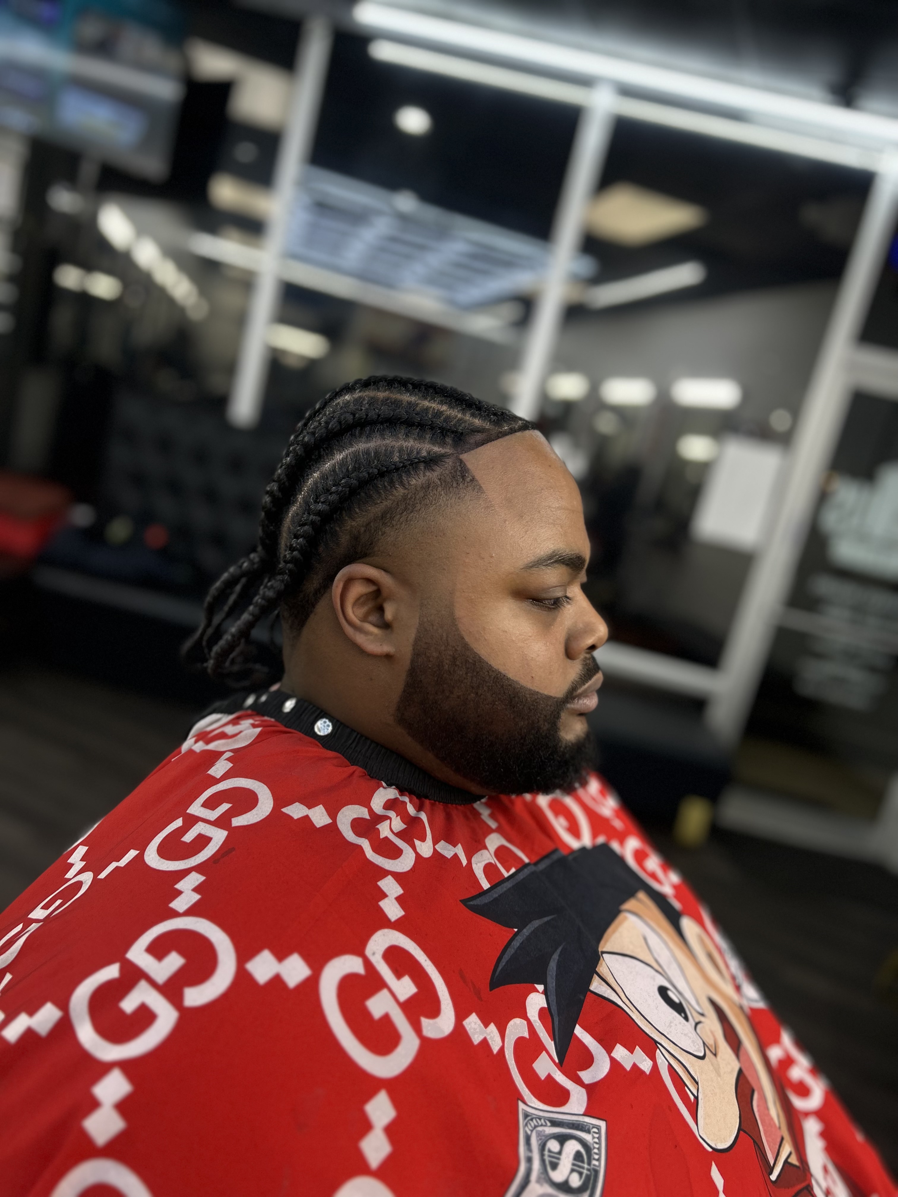 Customer haircut result at Famous Barbershop