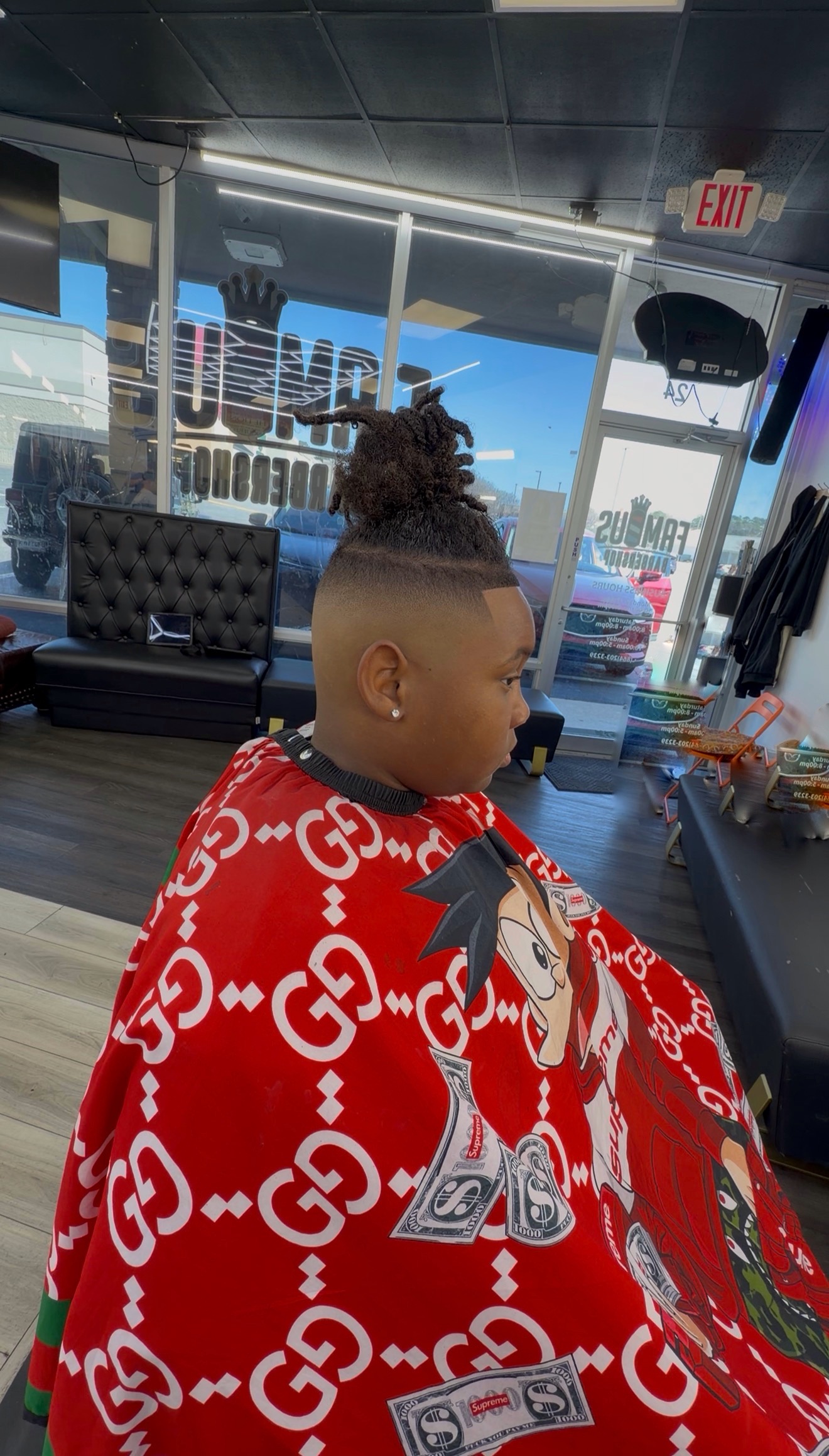 Barber cut result at Famous Barbershop