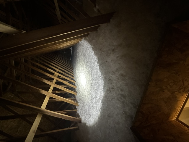 Blown-in fiberglass insulation installed by Elite Spray Foam Solutions in an Illinois home