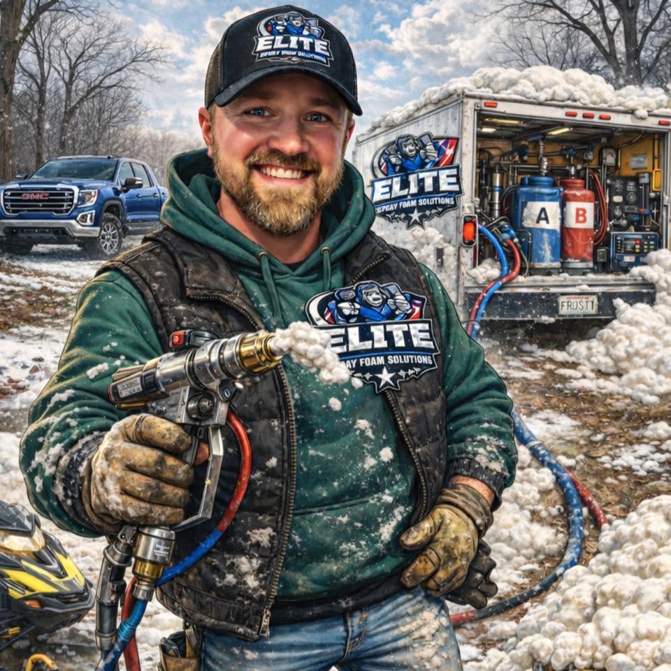 Owner of Elite Spray Foam Solutions holding a spray foam gun in front of the company rig in Knoxville, Illinois