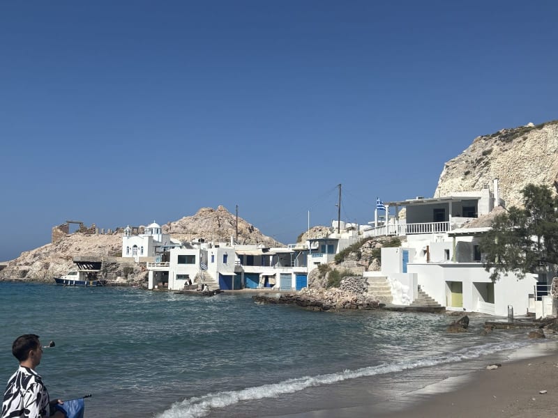 At Klima, the old boat garages are right at the waterline. The ruins above have been watching the fishermen for centuries.