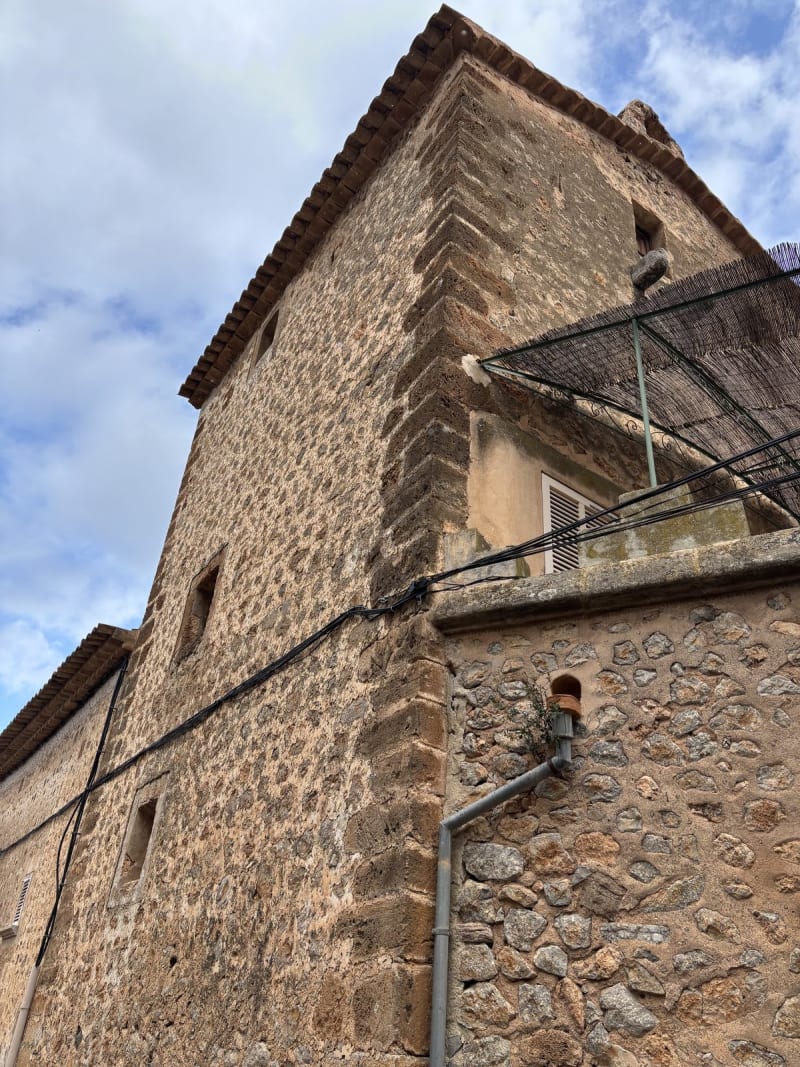 The towers were built for watching the sea for pirates. Now they watch for hikers with cameras.