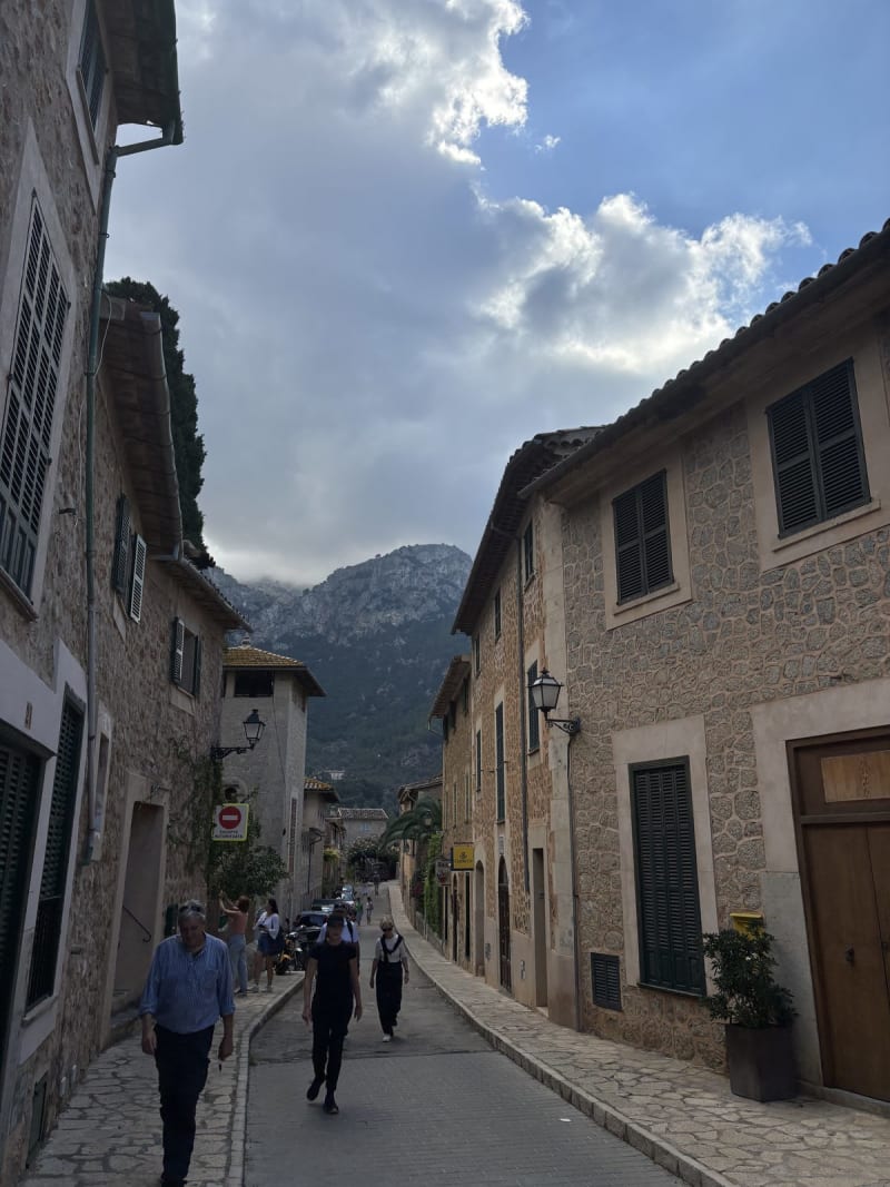 Every street in Deià ends with a mountain view. This is not an accident.