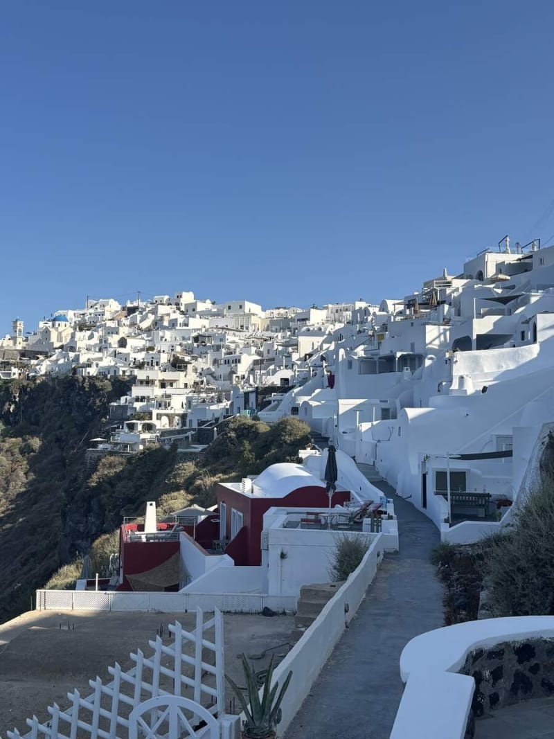 Imerovigli village cascading down the caldera — where the hike begins