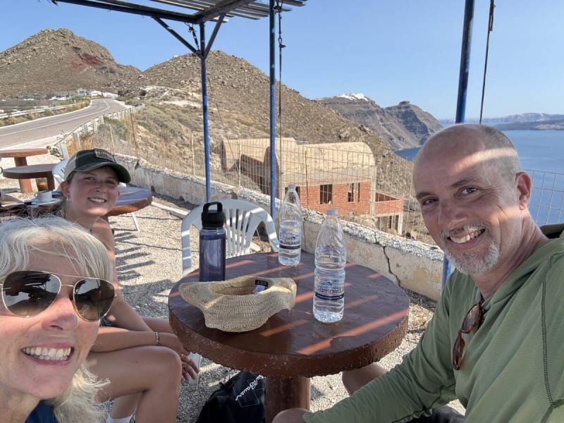 Looking south toward Fira — the caldera sweeping away behind every step north
