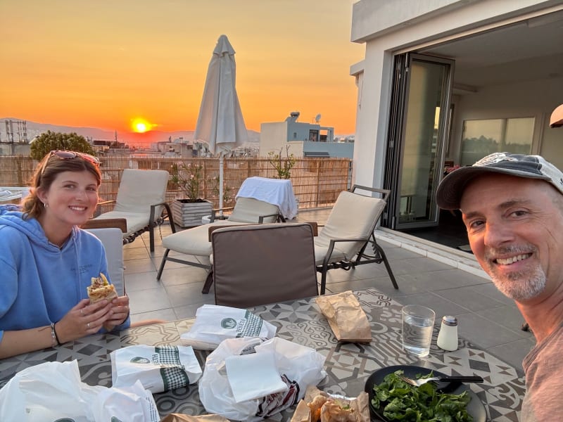 We ate takeout on the rooftop and watched the sun go down over Athens. Not a bad office.