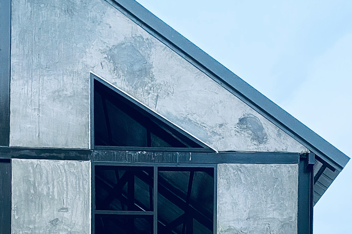 Véranda aluminium contemporaine avec mobilier design.